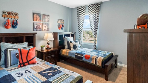 Upstairs guest bedroom with two twin beds