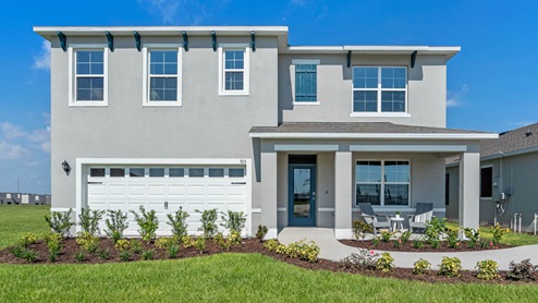 Two-story home with two-car garage with front porch