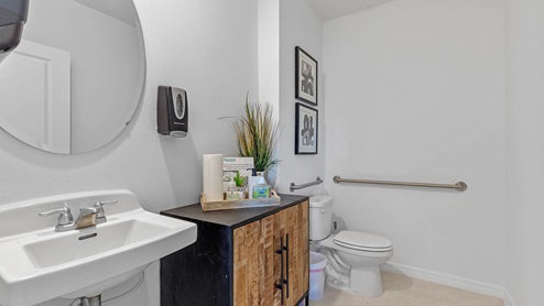 Guest bathroom on main floor altered to meet ADA compliance