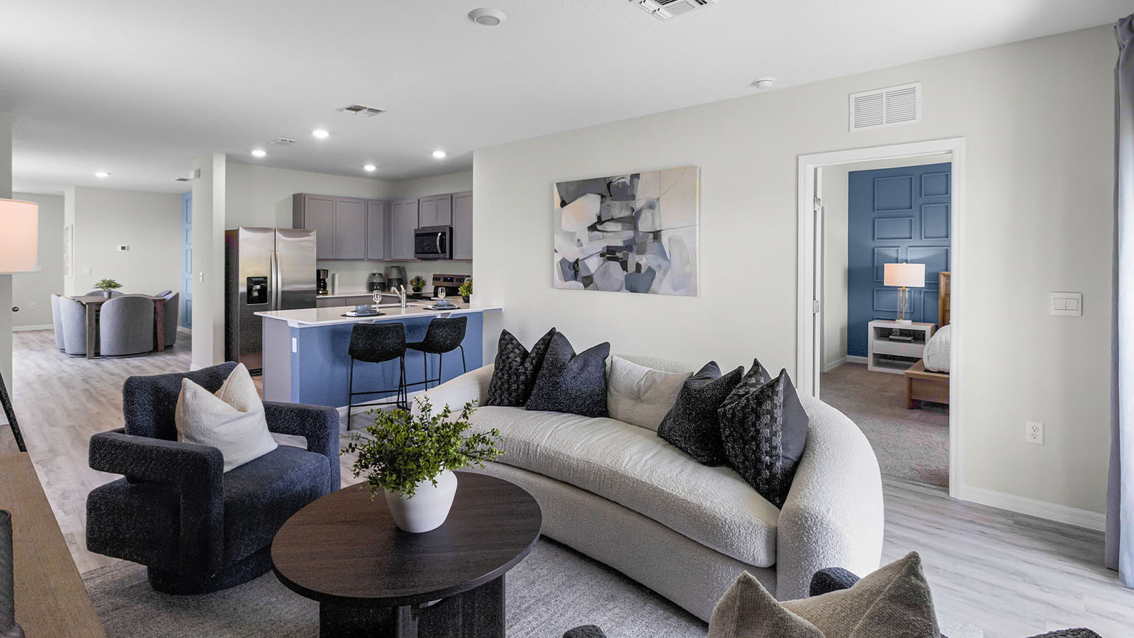 Living room with view of the kitchen
