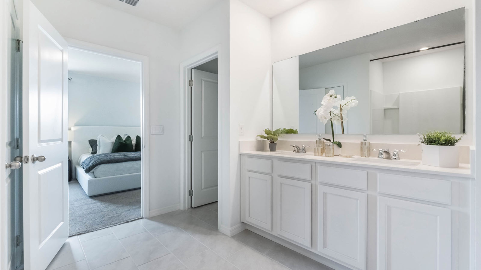 Primary bathroom with double vanity sinks