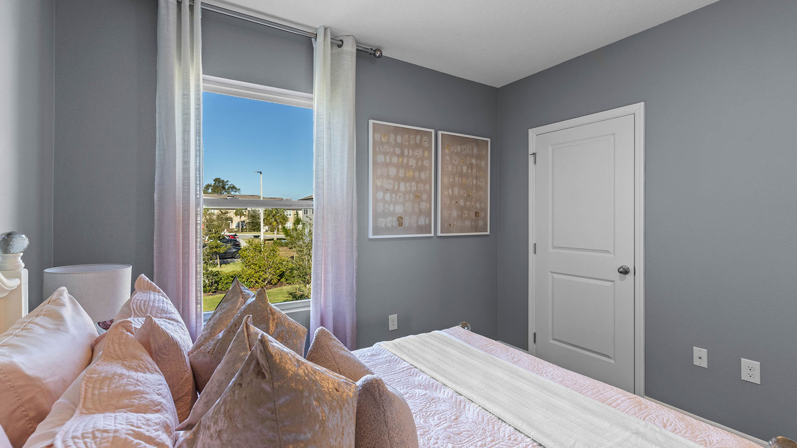 Guest bedroom staged as kids room with full size bed