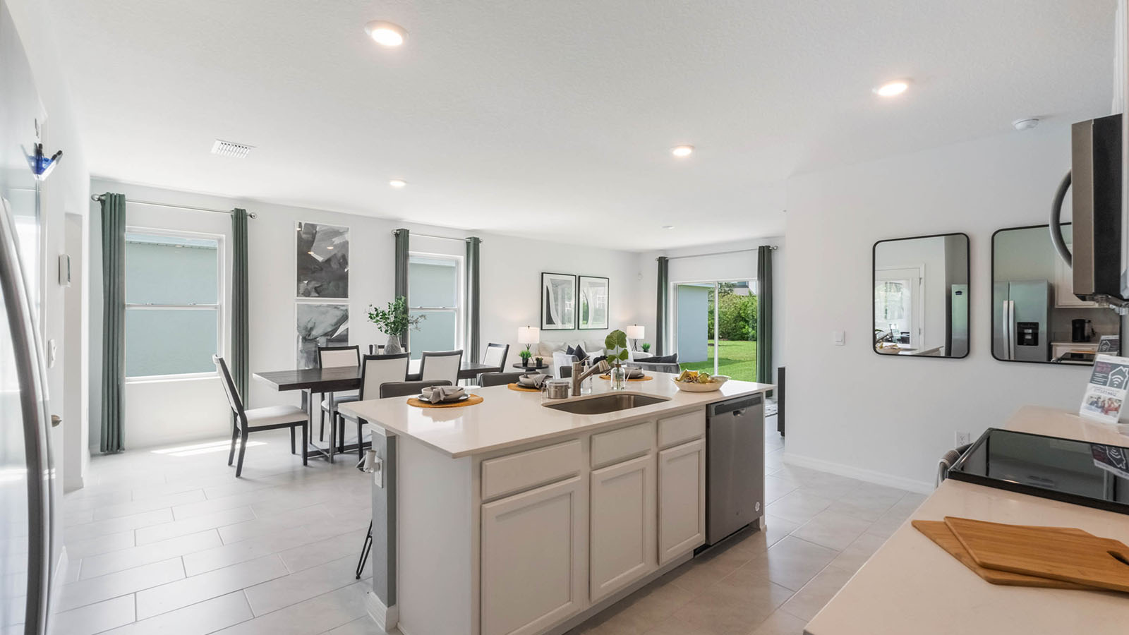 Kitchen with quartz countertops and stain-less steel appliances