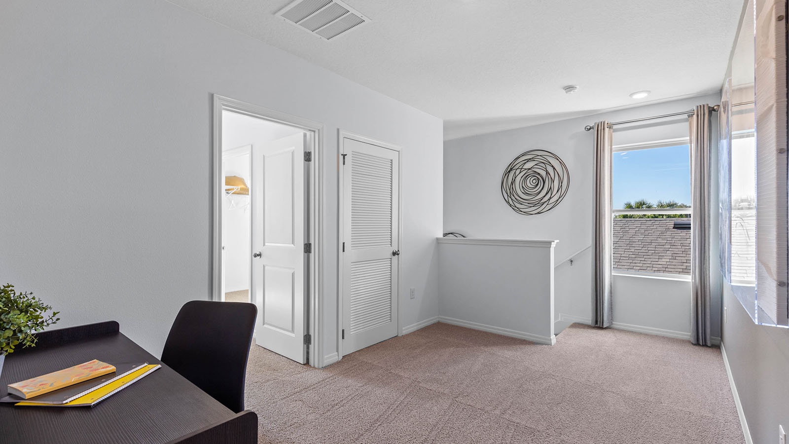 Upstairs loft with desk and open space