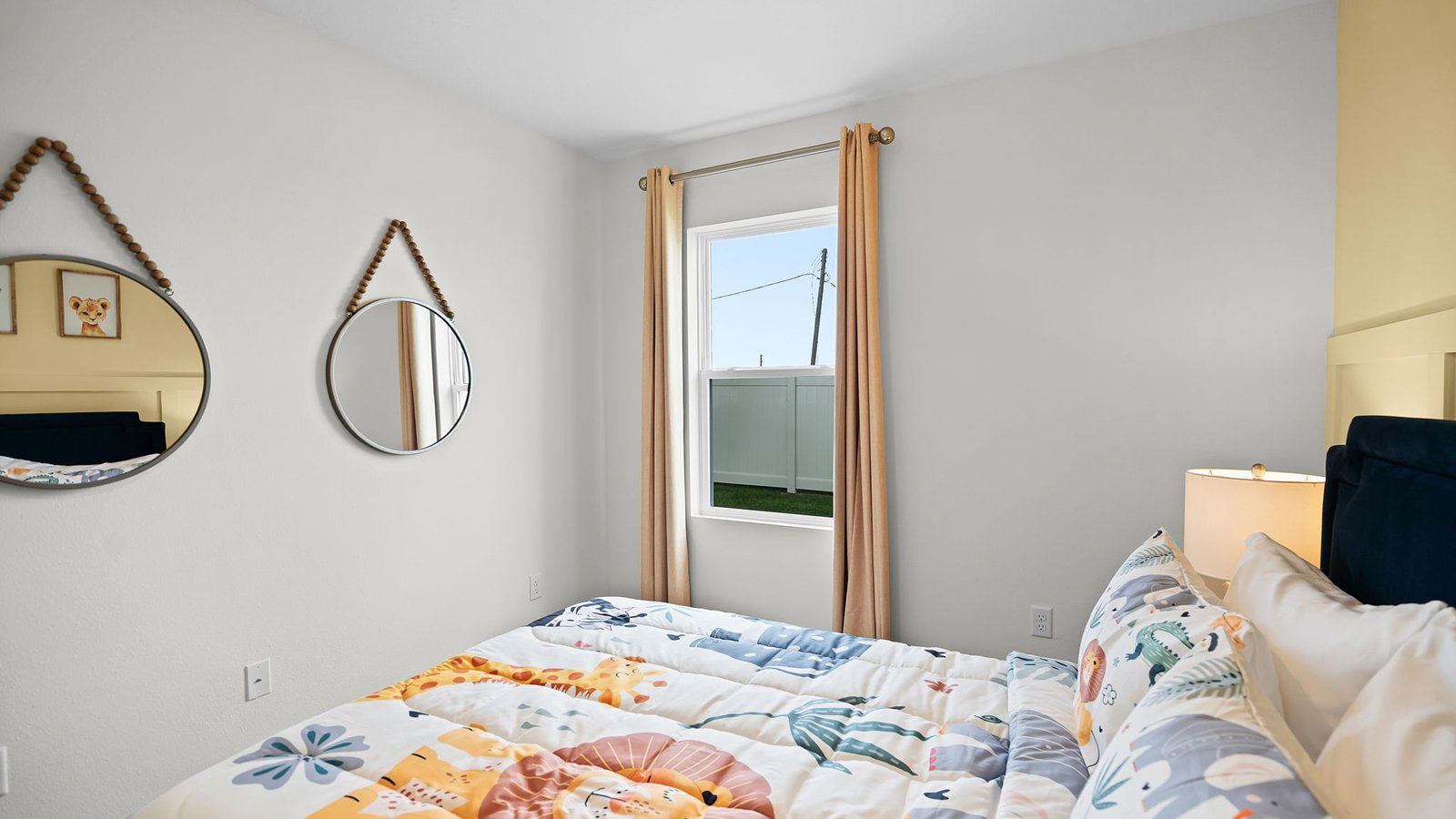 Guest bedroom with full size bed and young child decor