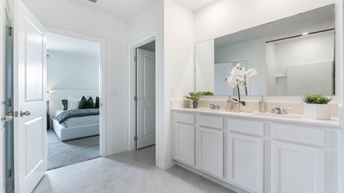Primary bathroom with double vanity sinks