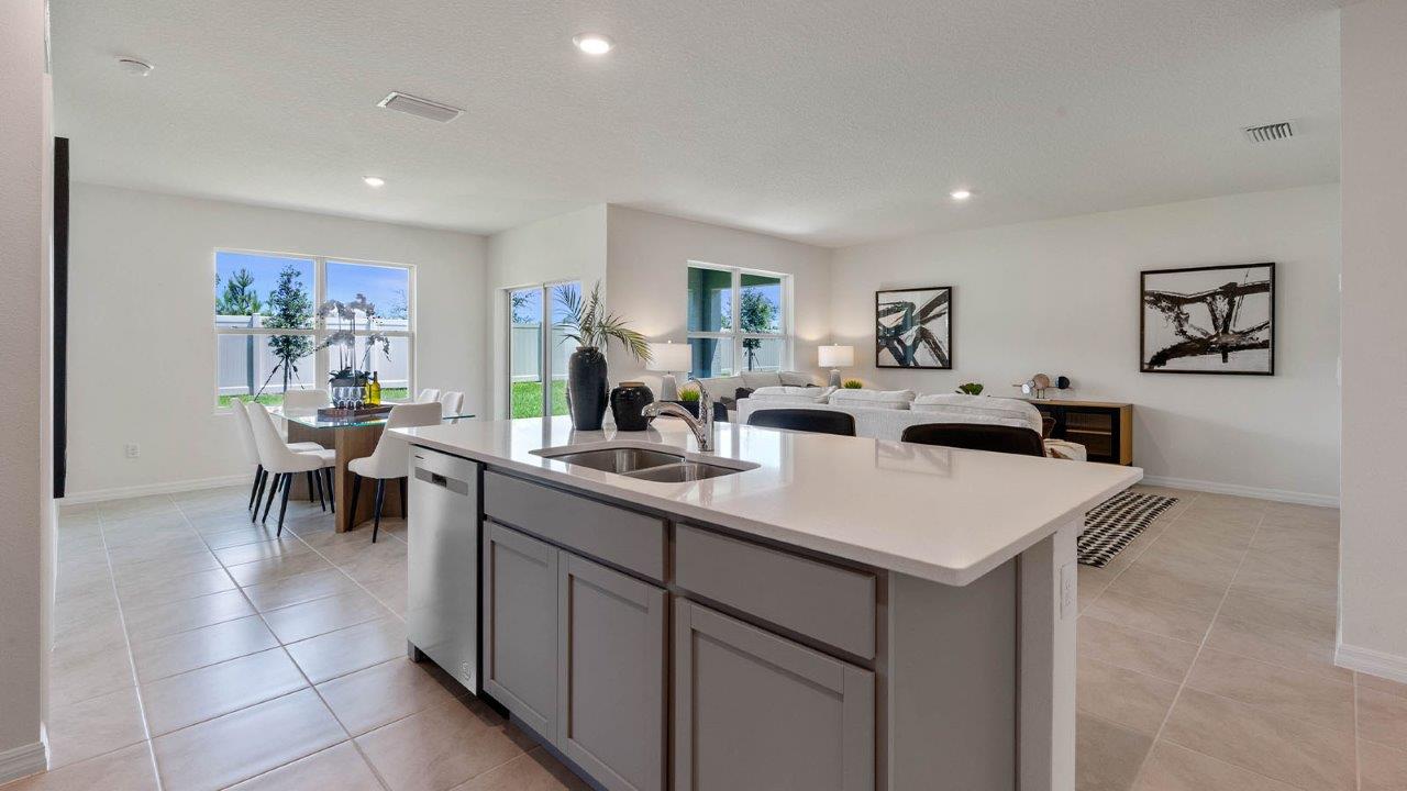 Kitchen island with ceramic tile throughout the home