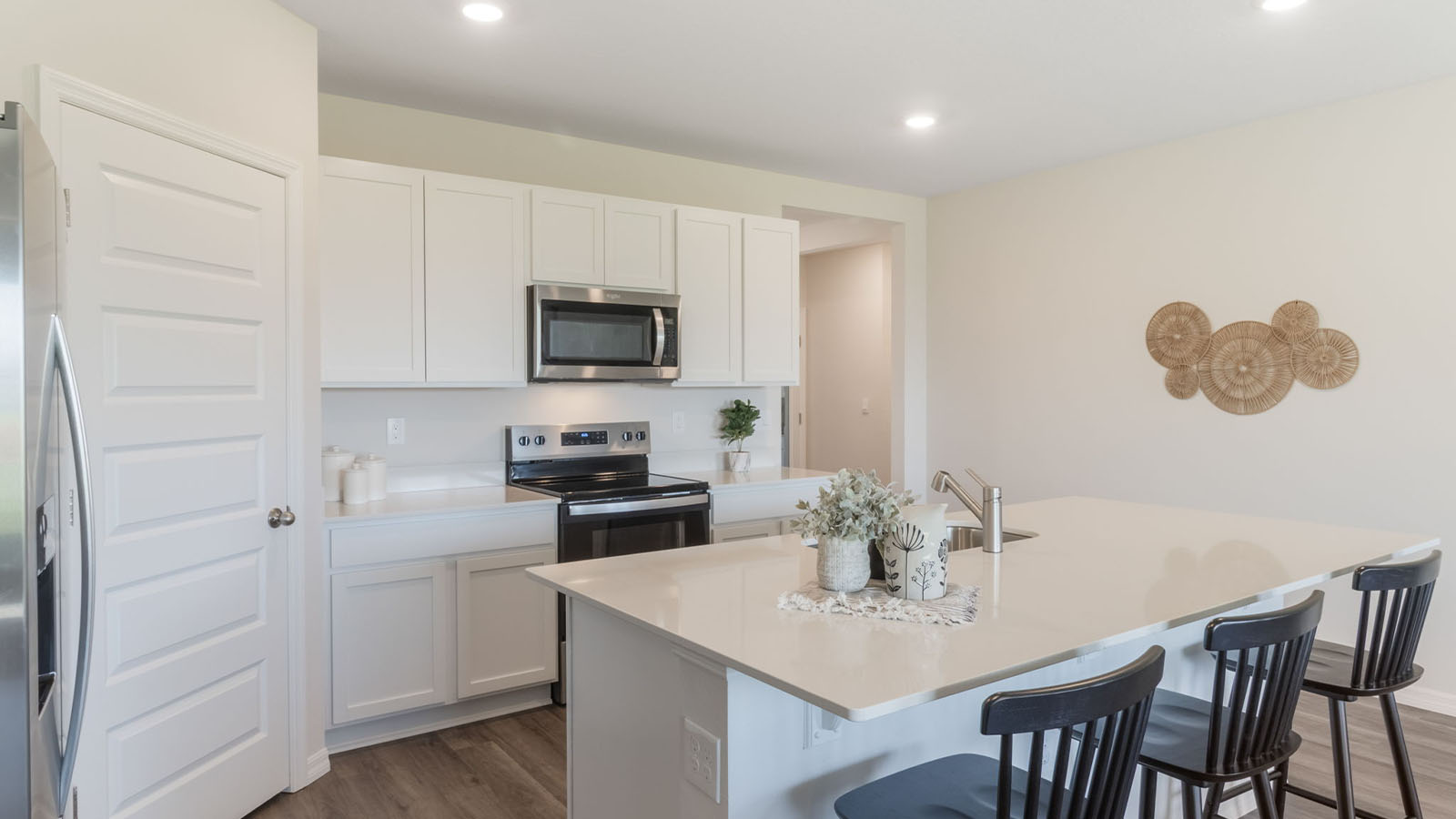 Kitchen with island and stainless steel appliances