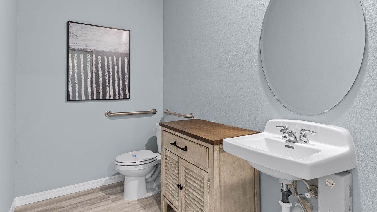 Guest bathroom modified for sales office