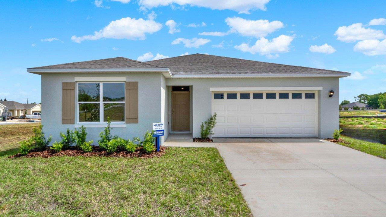 Single-story home with two-car garage and front porch