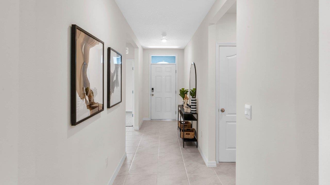 Hallway to open concept living areas