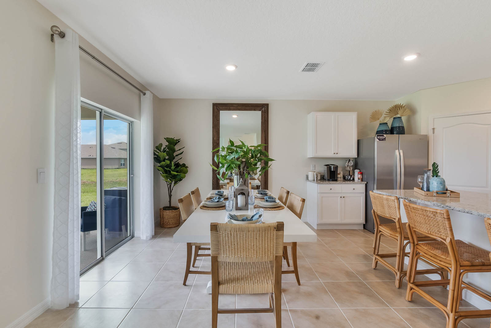 Dining room with patio doors and large dining table