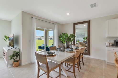 Dining room with back patio doors