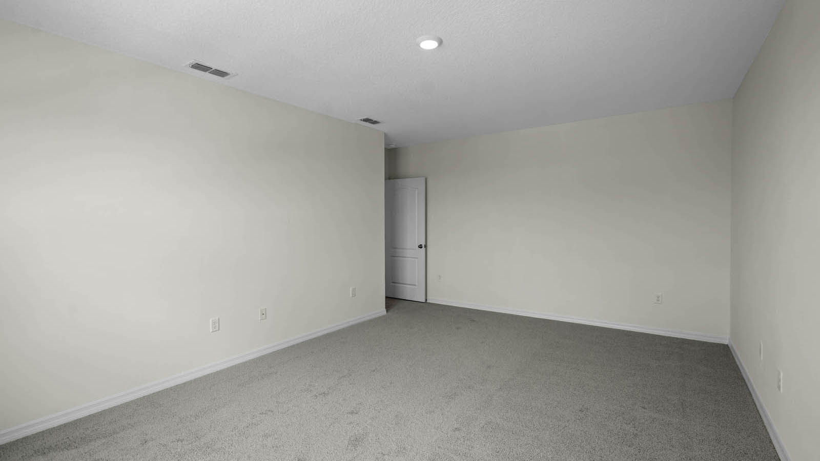 Spacious primary bedroom