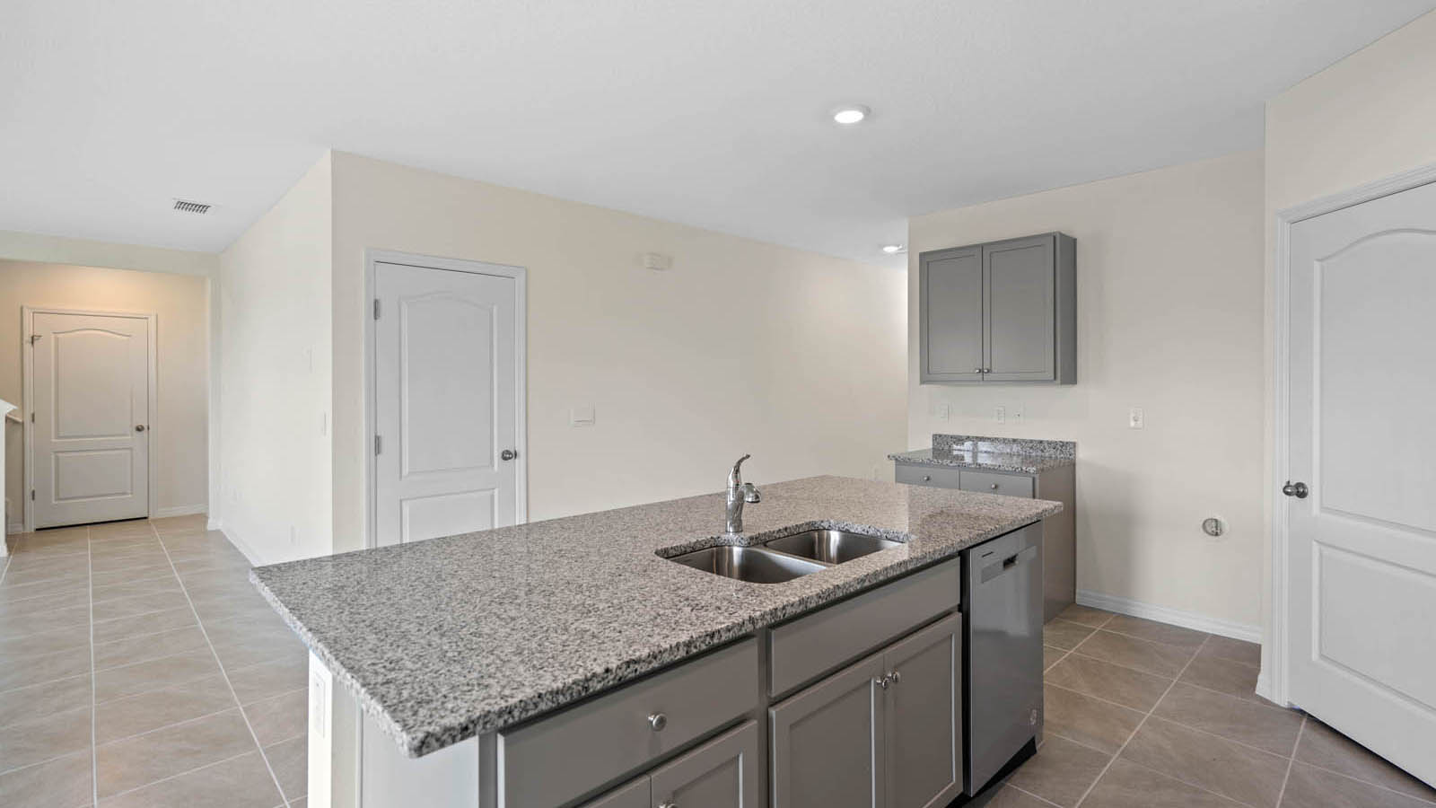 Kitchen island with sink and seating space