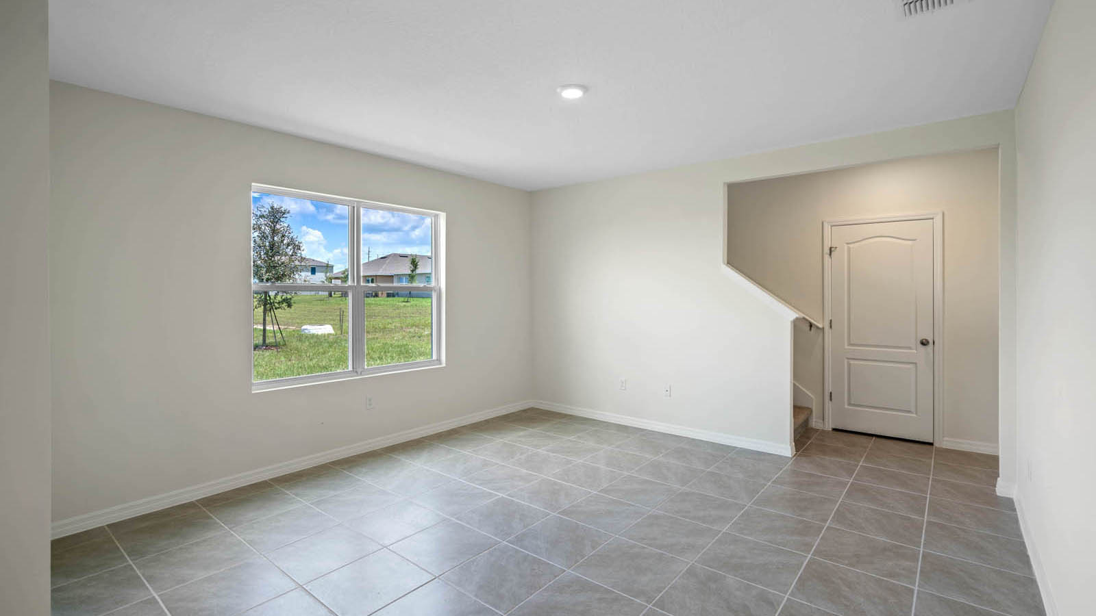Spacious great room with ceramic tile flooring