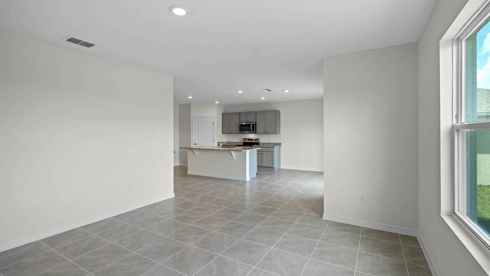 Great room with view of the kitchen and dining room