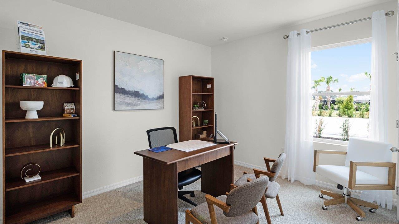 Office with window and carpet flooring