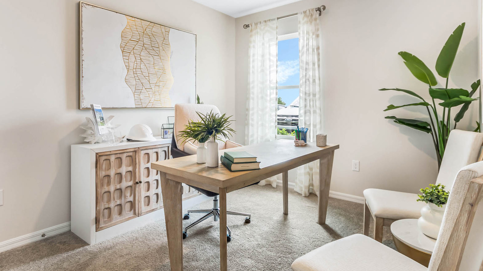 Office with desk and chairs