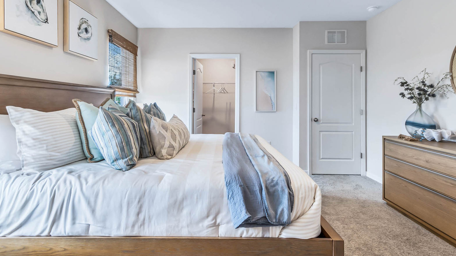 Primary bedroom with walk-in closet