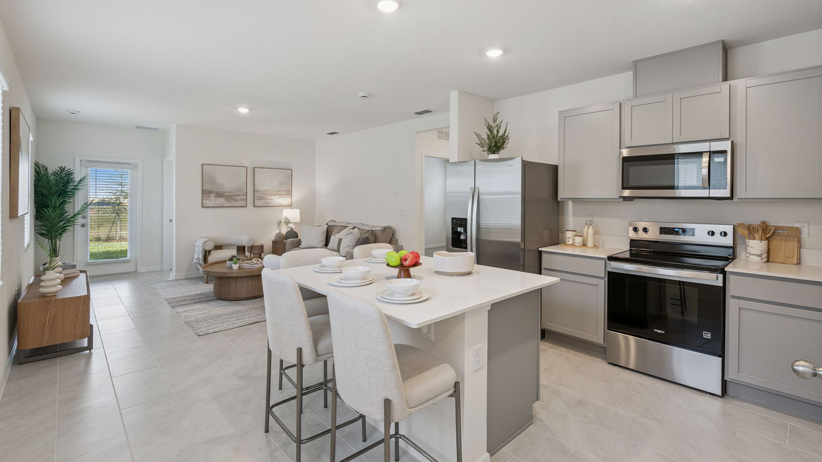 Kitchen with island and view to living room