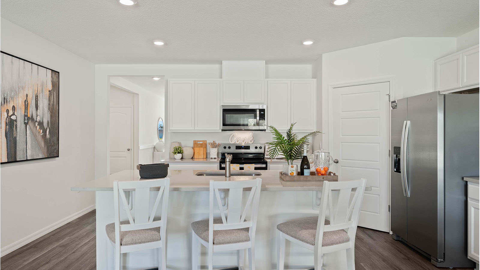 Spacious Kitchen with island and luxury vinyl plank floors