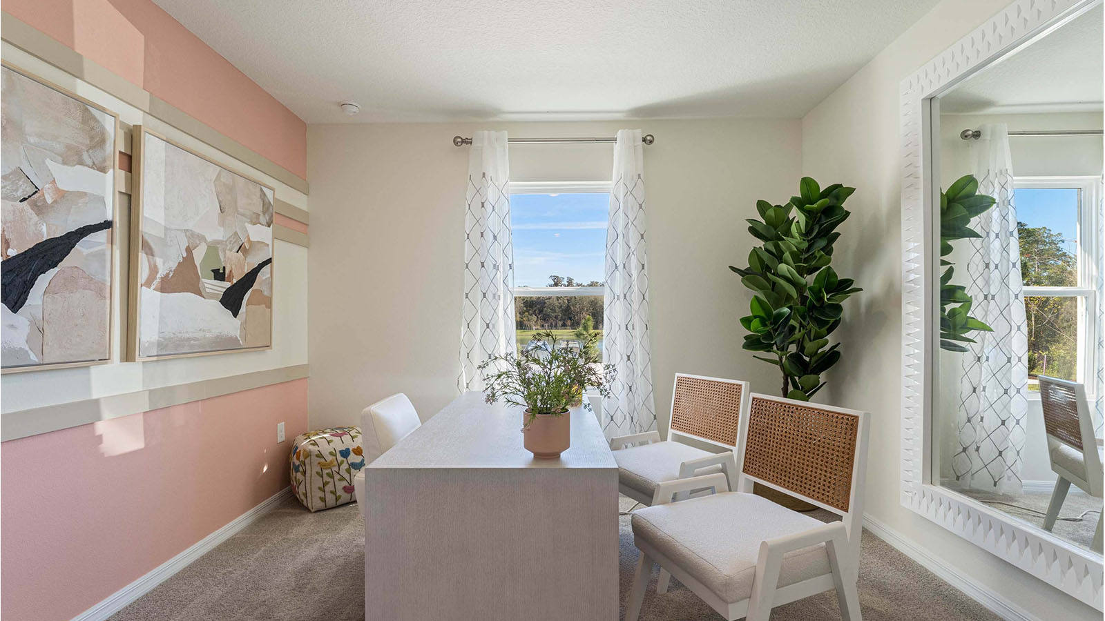 Office with desk and chairs with window