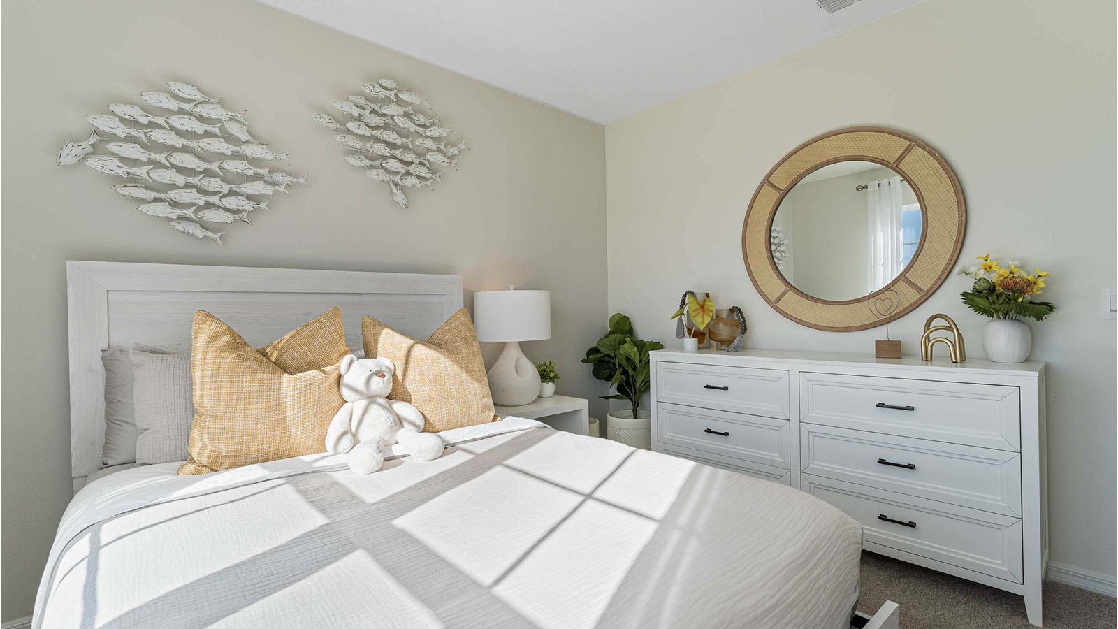 Guest room with queen size bed and dresser