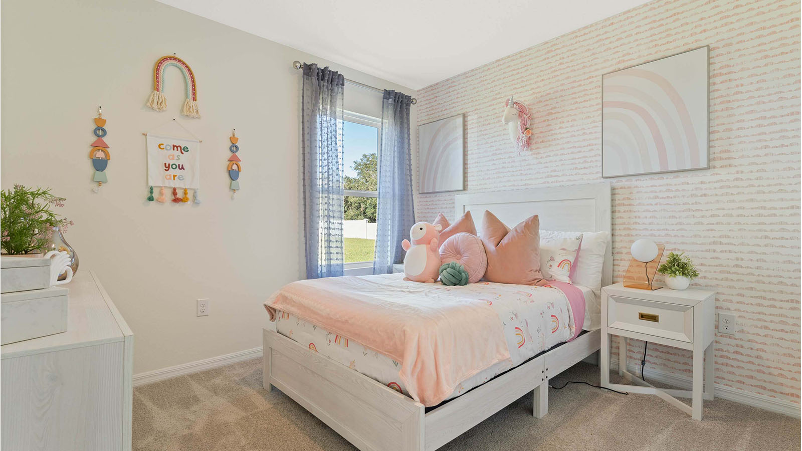 Kids bedroom with full size bed and window