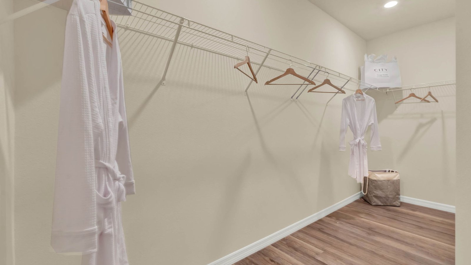 Primary bedroom closet with wire racks