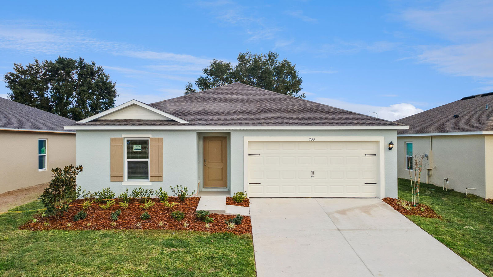 Front Exterior Image of a Single Family Home with 2-car Garage
