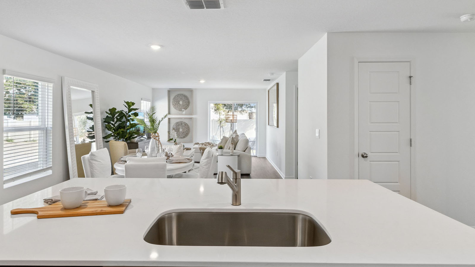 Kitchen sink view to the living room
