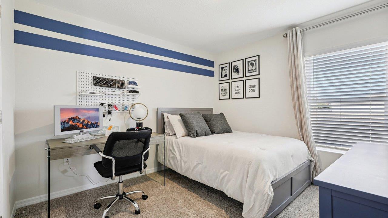 Guest bedroom decorated as a gamer room