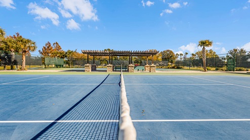 close up of tennis court and seating area
