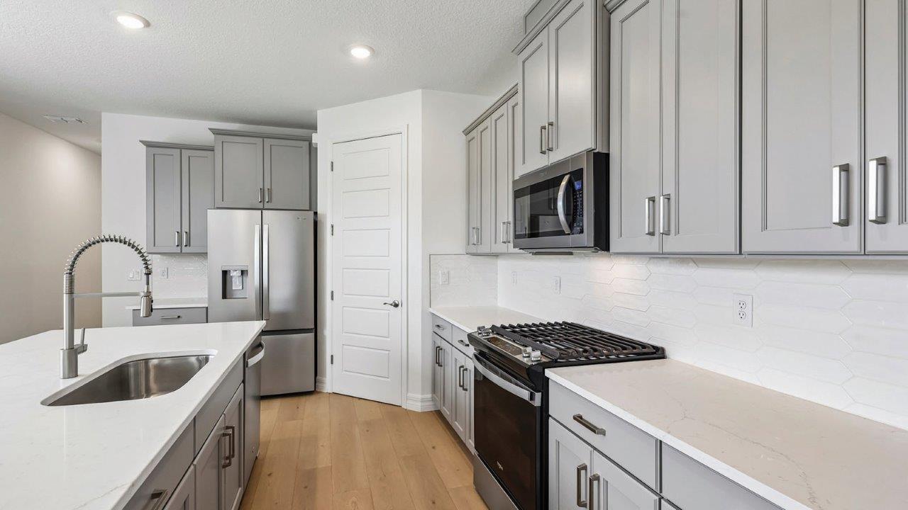 Kitchen with stainless steel appliances