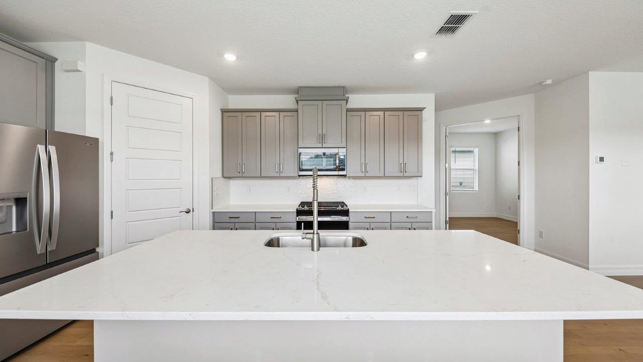 Kitchen with large island and cabinets