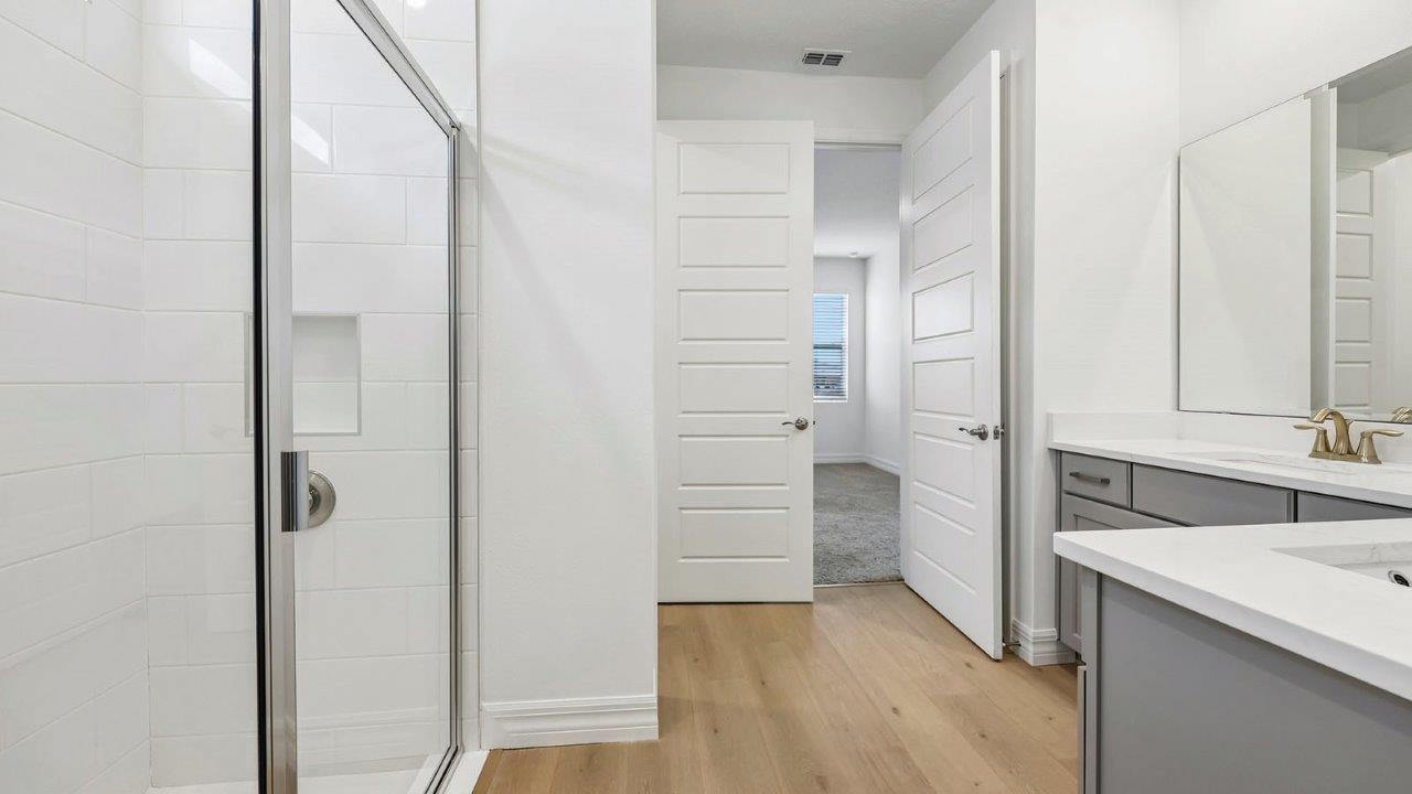 primary bathroom with walk in shower