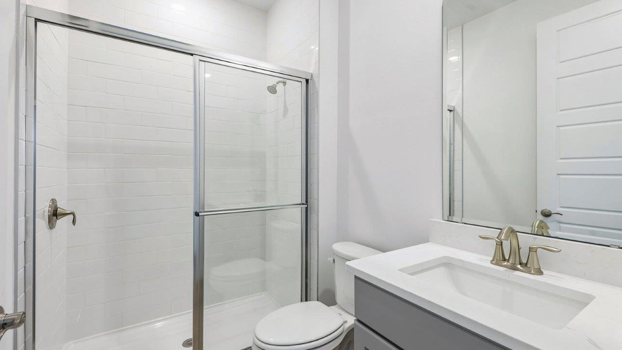 Guest bathroom with enclosed shower
