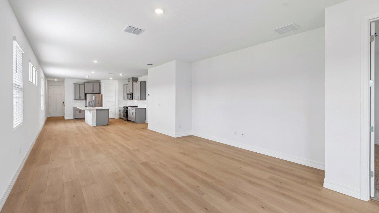 Living room with view to kitchen