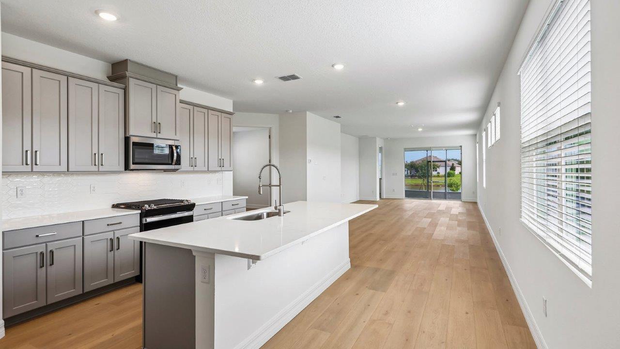 Kitchen with large eat in island
