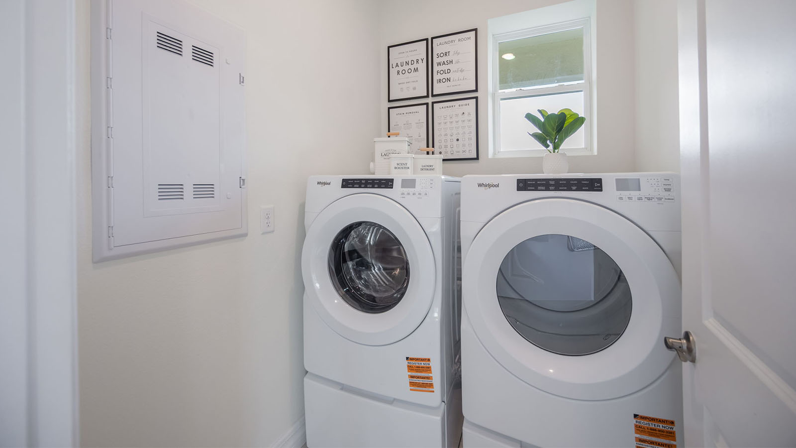 Laundry room with front-load washer and dryer