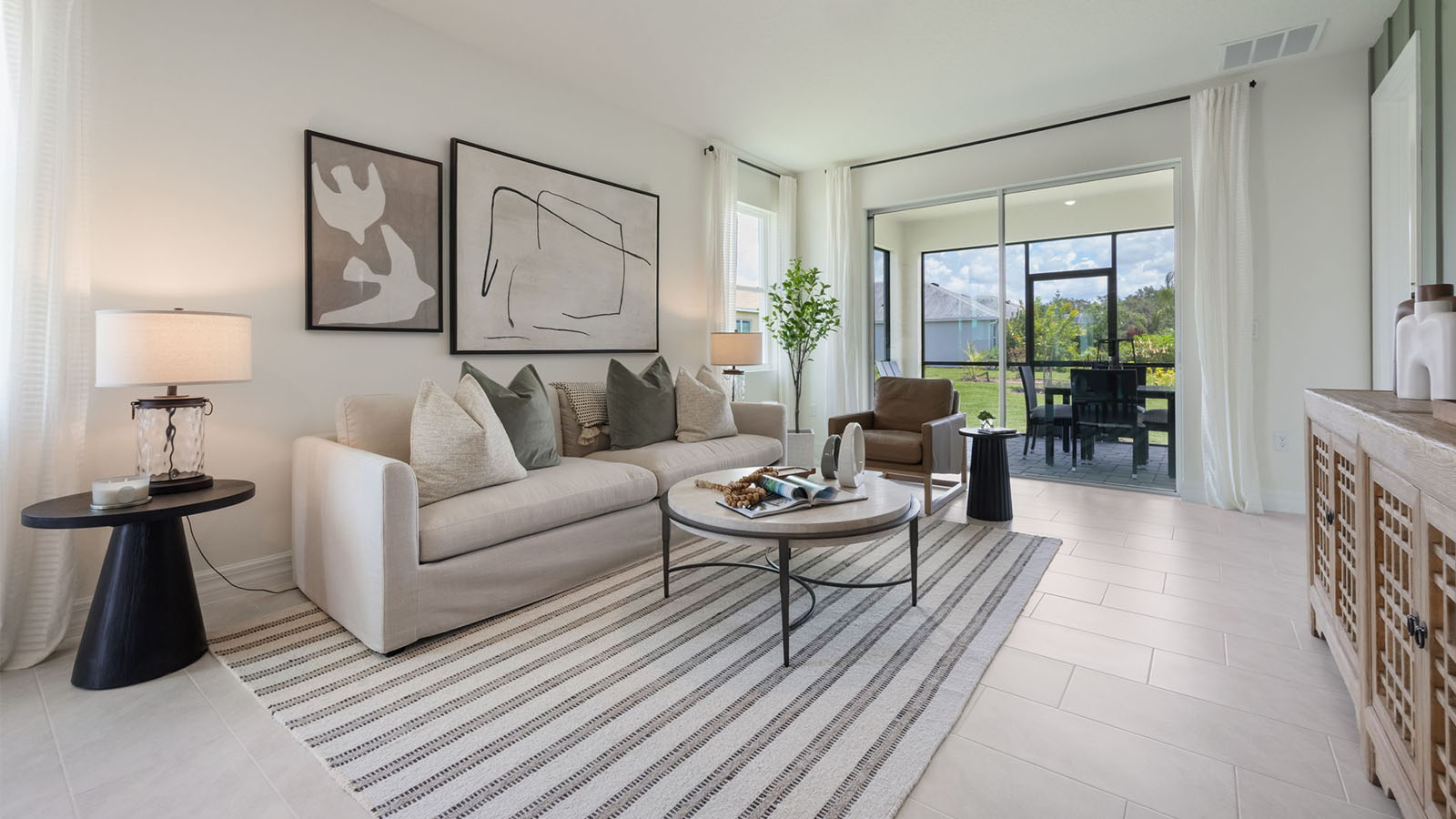 Spacious living room with sliding glass doors to the back porch