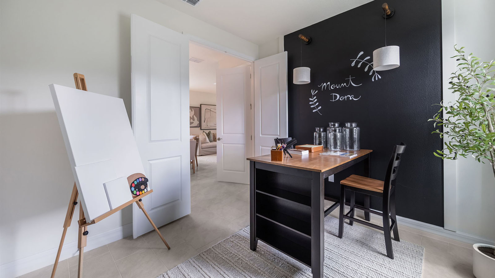 Flex room staged as an art room