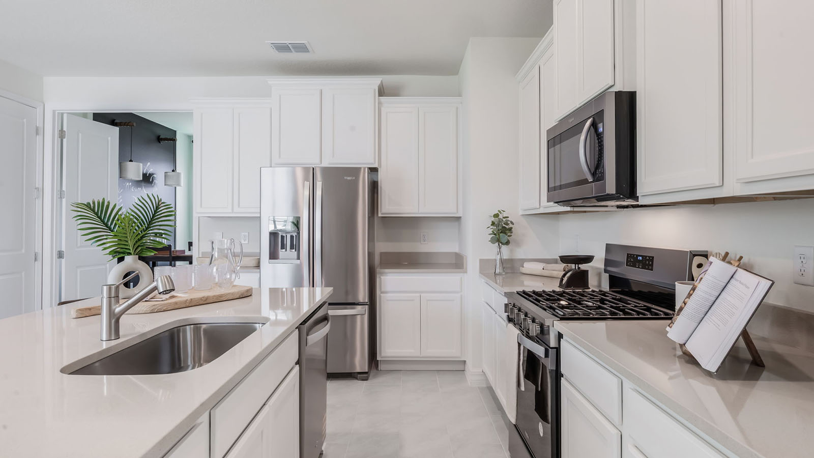 Kitchen with spacious counter space and gas stove