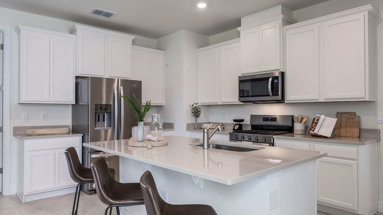 Large kitchen island with sink and seating