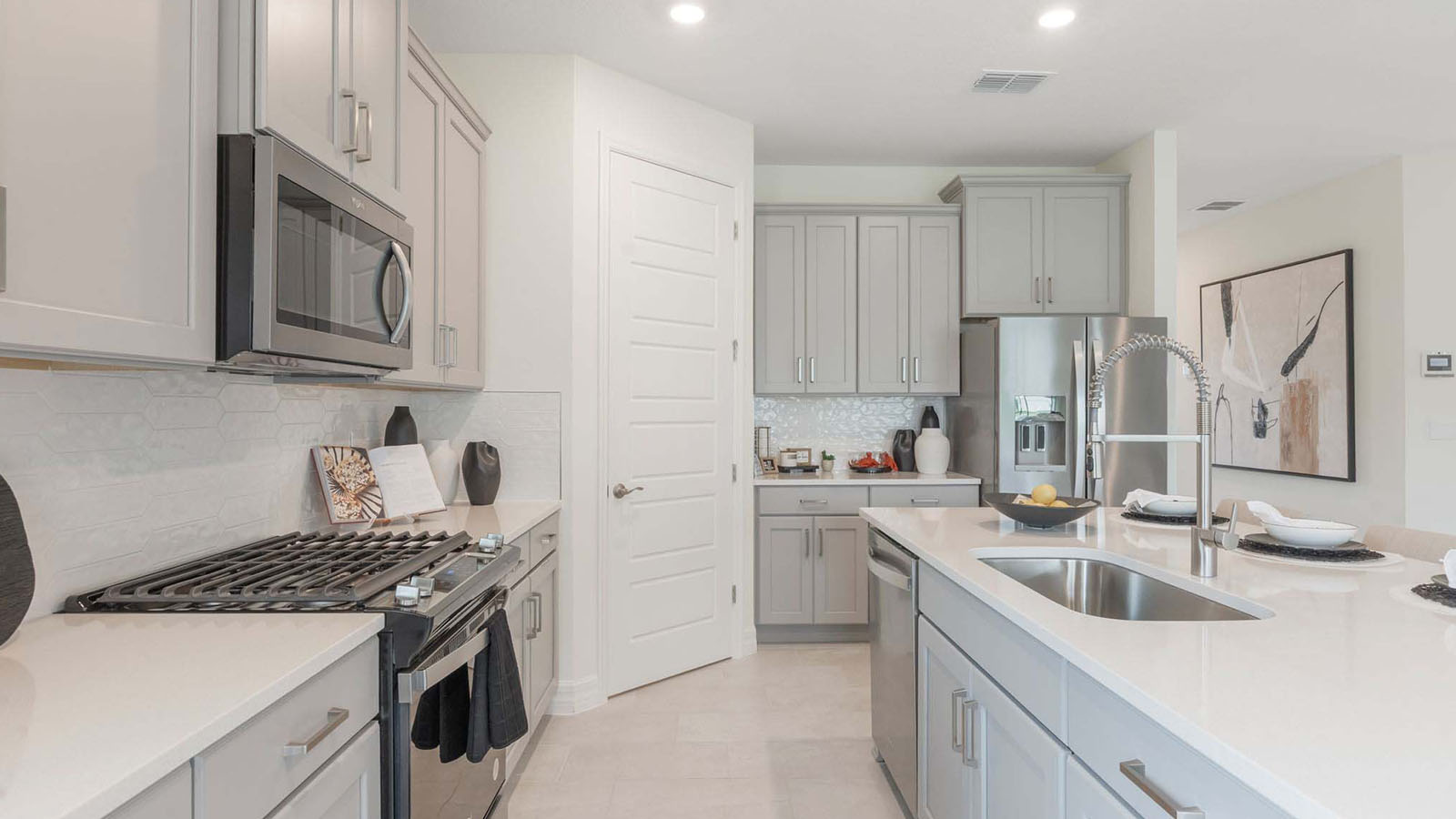 Kitchen with gas stove and stainless steel appliances