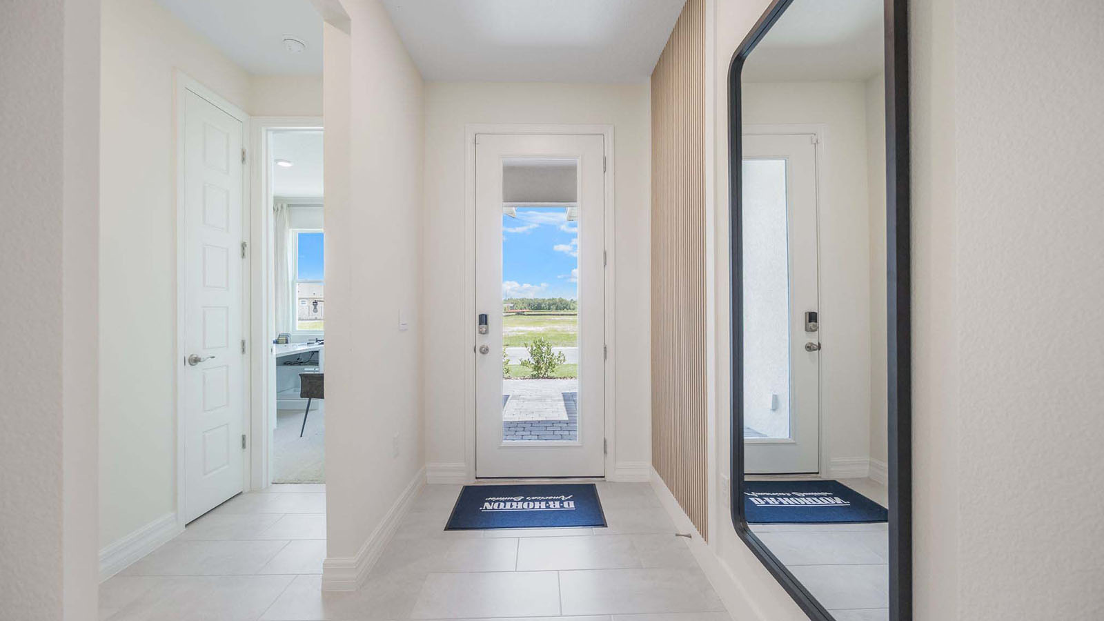 Entrance to the home with view of one bedroom