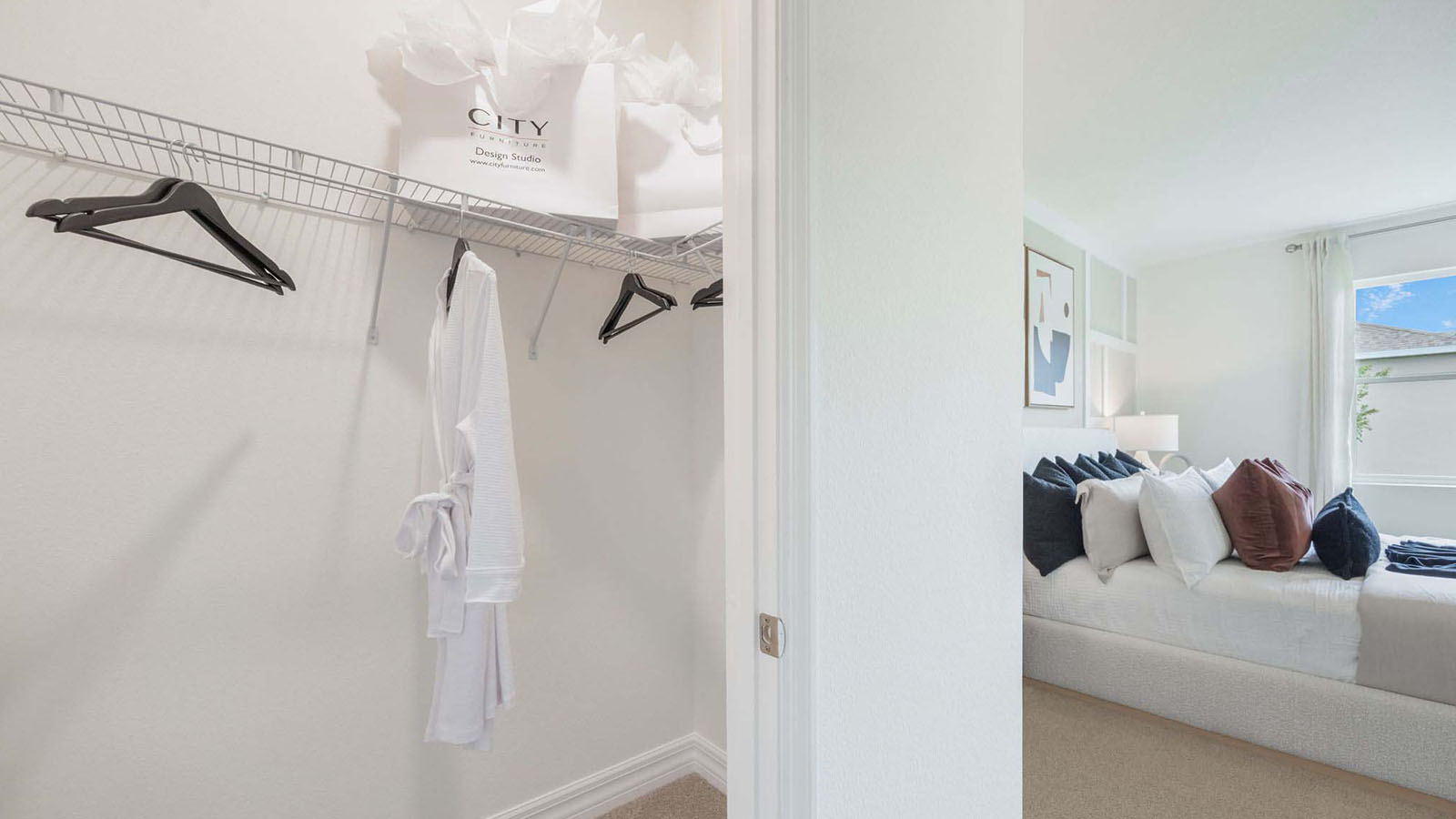 Primary bedroom view from walk-in closet