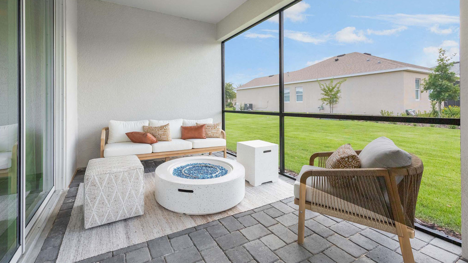 Screened in back porch with seating