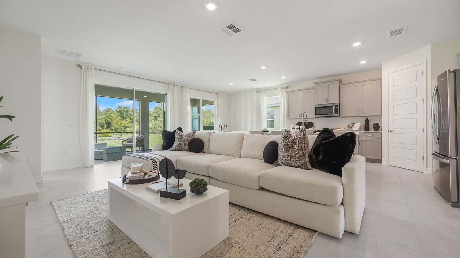 Living room with view to the primary bedroom